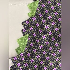 Beautiful hand made Quilt floral pattern reverses to green and has piqued edge